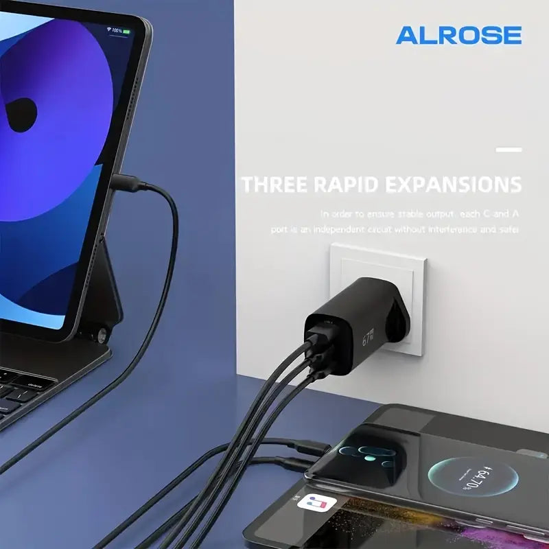 Black USB-C adapter with multiple cables connected to a laptop and phone, on a blue surface with 'ALROSE' branding.